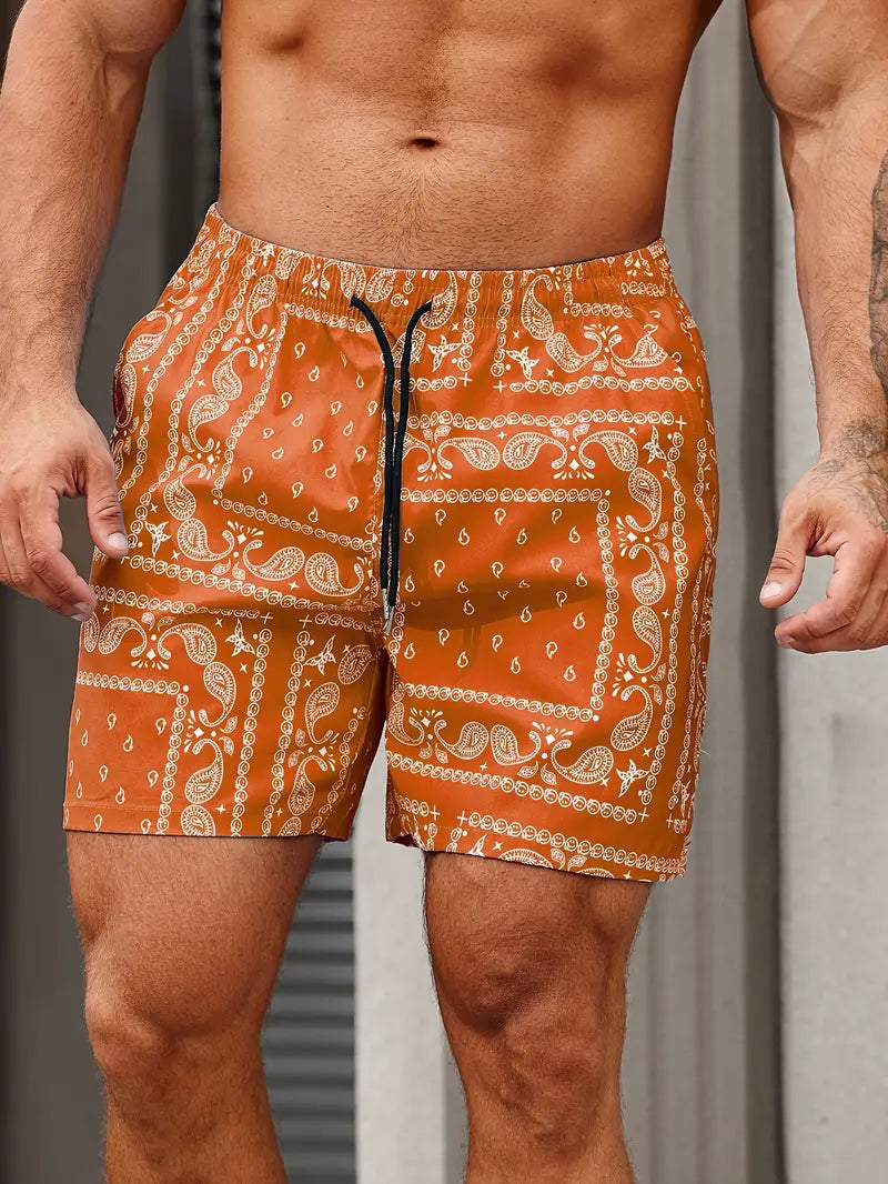 Herrebadeshorts – afslappet pasform – hurtigtørrende stof – bandanamønster – midtlængde