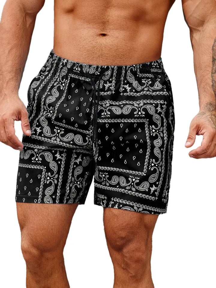 Herrebadeshorts – afslappet pasform – hurtigtørrende stof – bandanamønster – midtlængde
